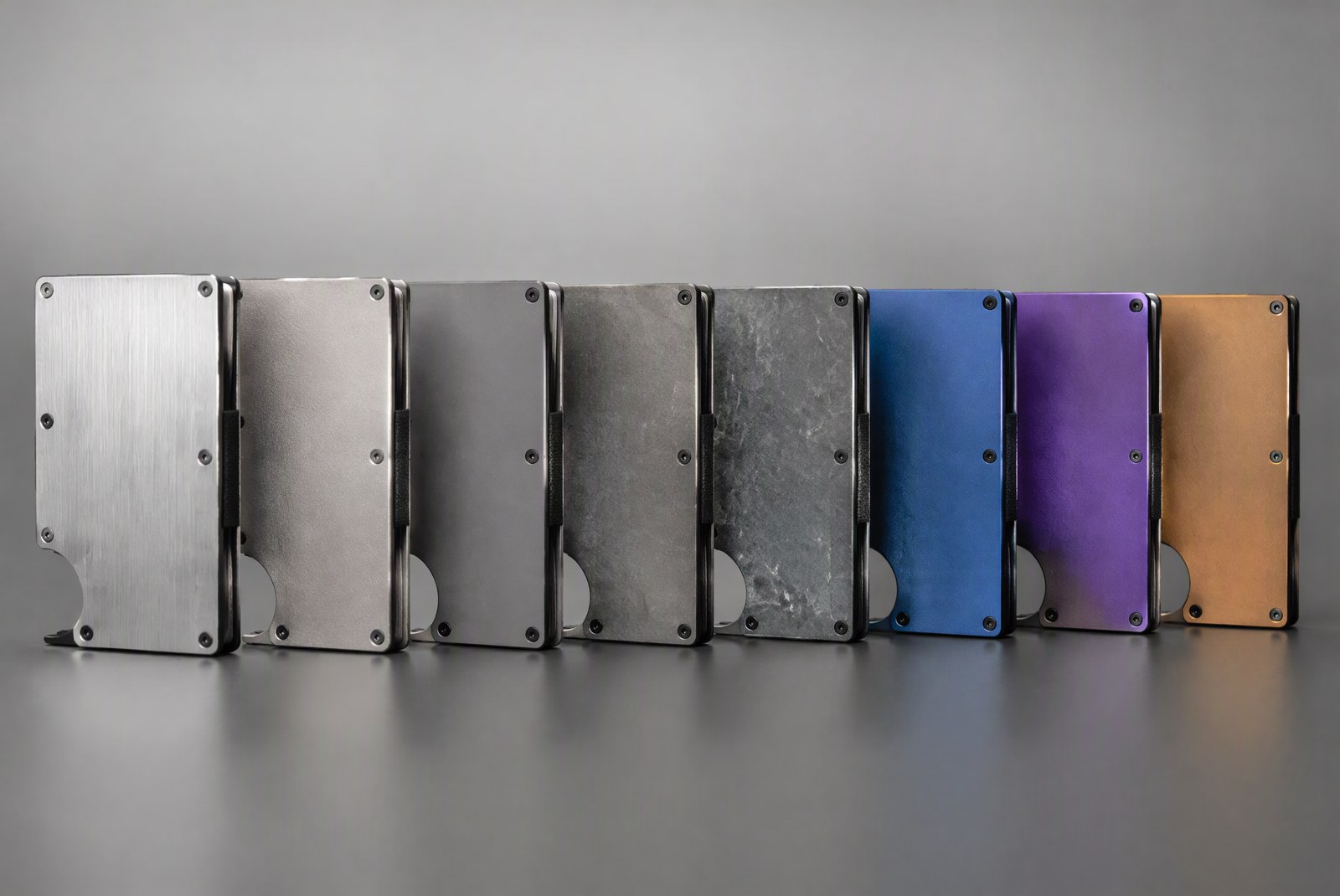 types: flat-lay of titanium wallet styles: two-plate, single-plate, money clip, pop-up and hybrid, product photography