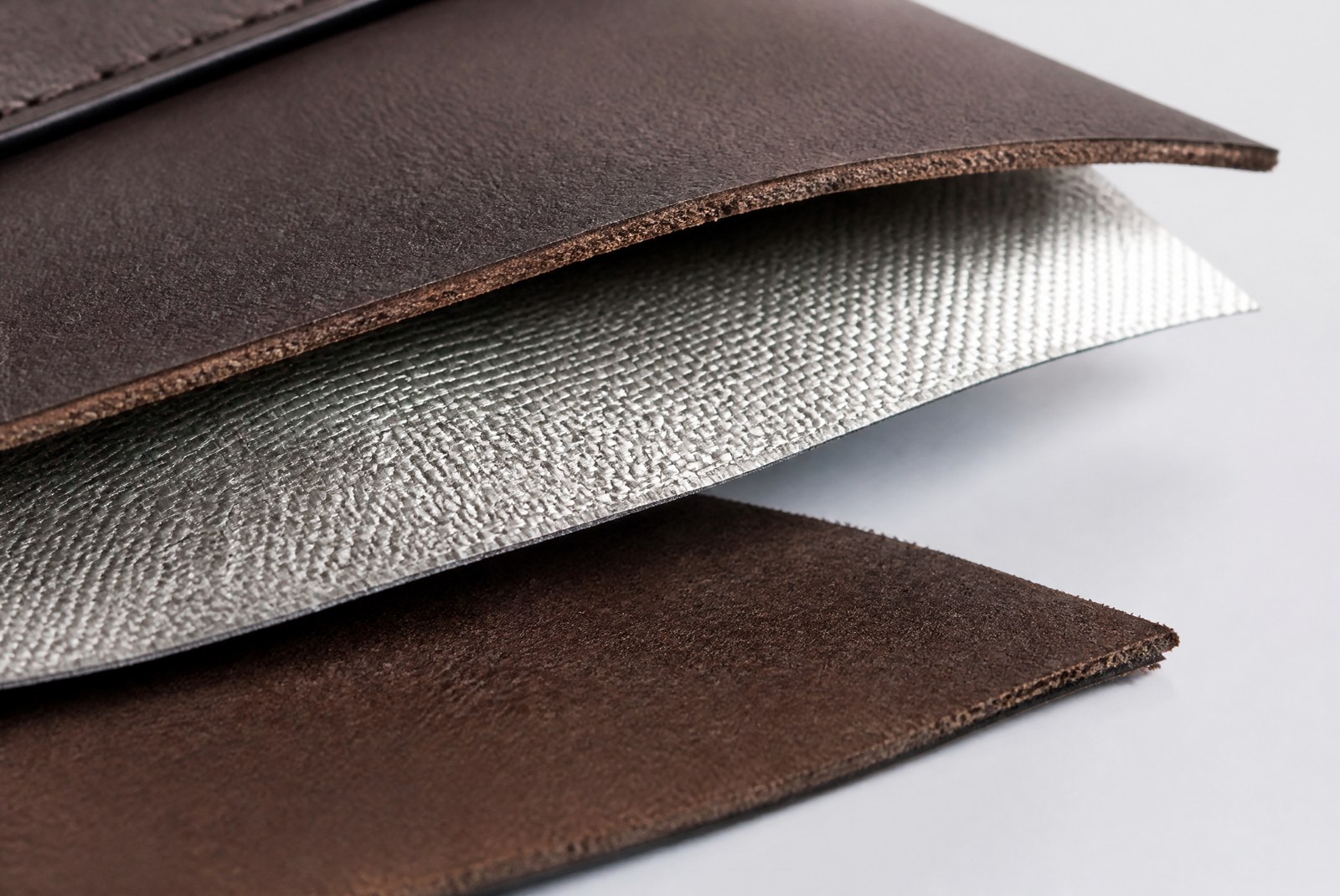 Aluminum and carbon-fiber card holders arranged on a clean surface
