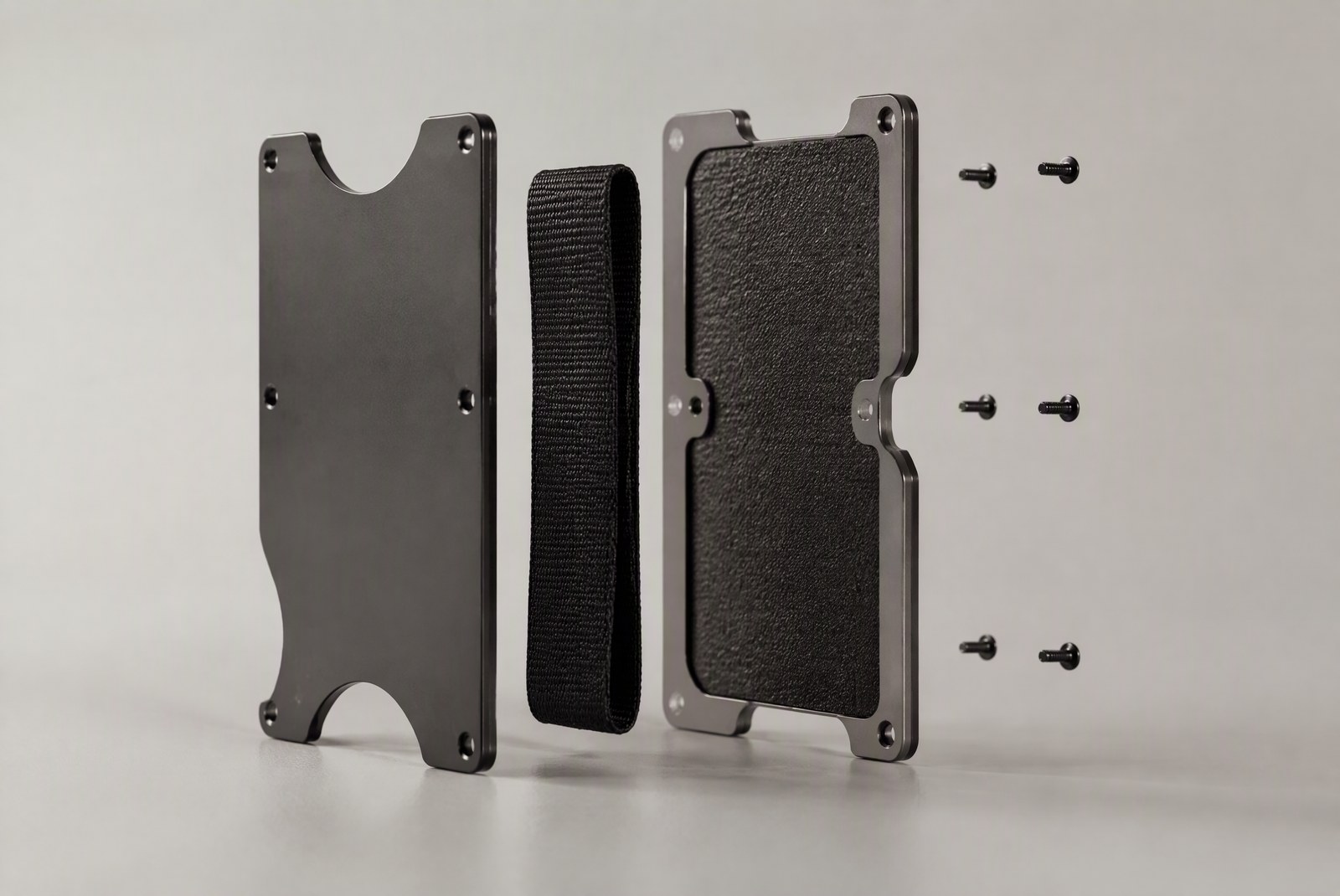 Test rig measuring plate tension, drop impact and card access cycles on wallet frames