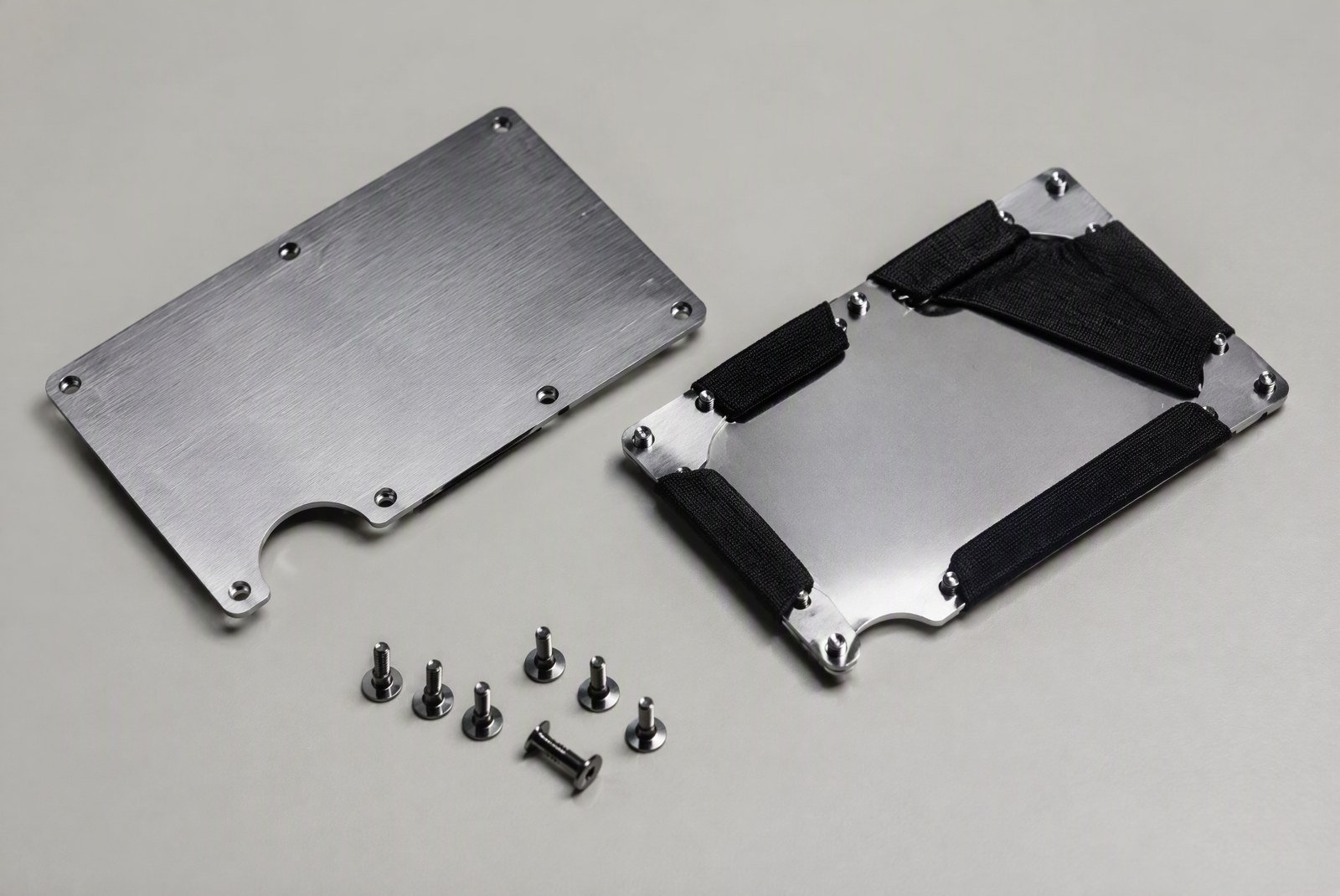 Ridge Wallet disassembled: plates, band, cash clip accessory